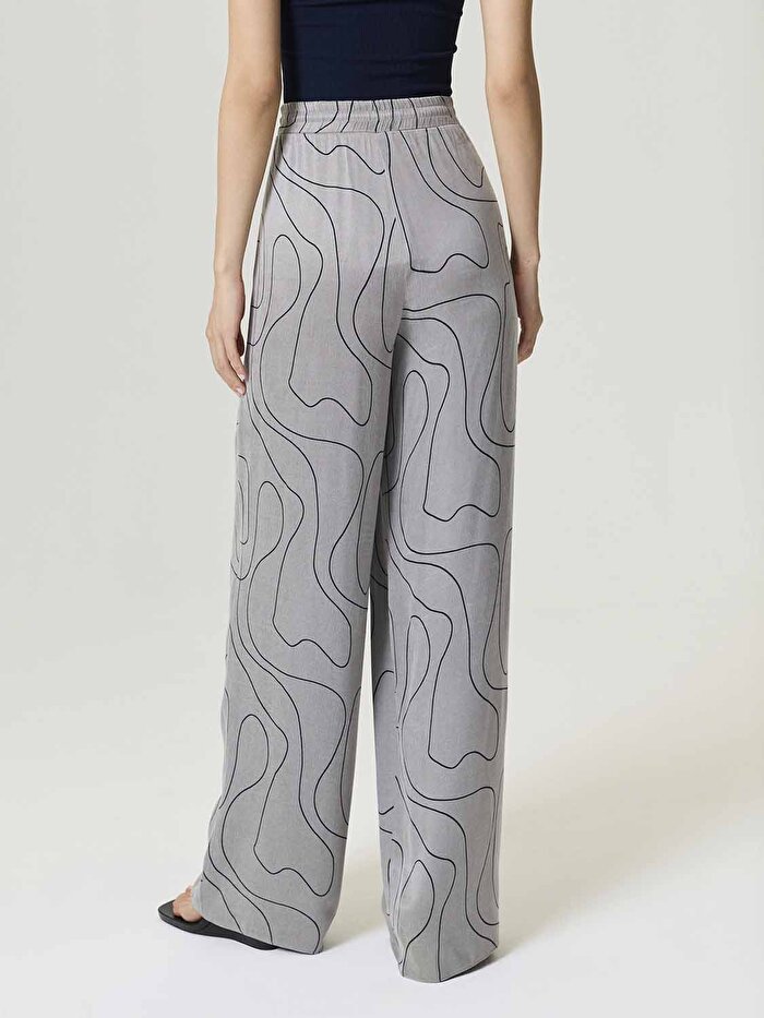 Nocturne Dökümlü Geniş Paça Pantolon